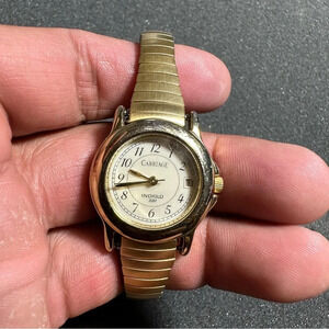 Carriage Indiglo Date Just Ladies Quartz Watch Gold Tone Stretch Band Working